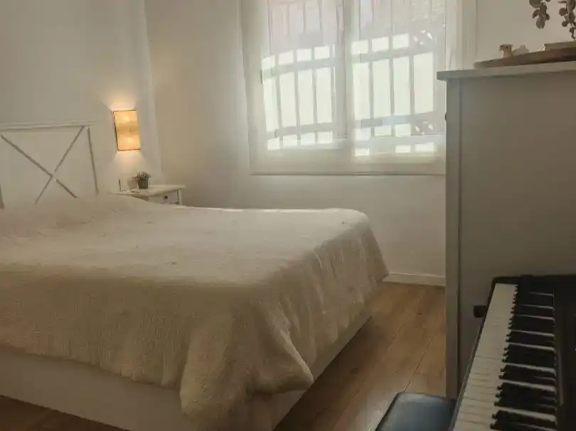 Dormitori de Dúplex de lloguer en Córdoba amb Aire condicionat, Jardí privat i Parquet