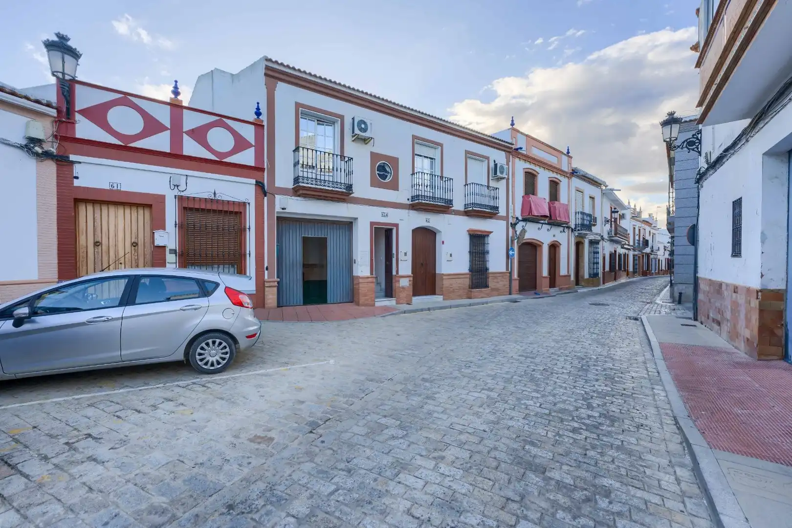 Vista exterior de Casa adosada en venta en La Palma del Condado con Aire acondicionado, Calefacción y Terraza