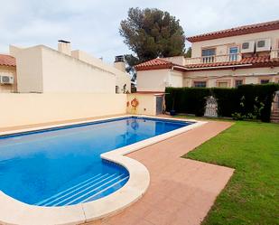 Piscina de Casa adosada en venda en Mont-roig del Camp amb Aire condicionat, Jardí privat i Terrassa