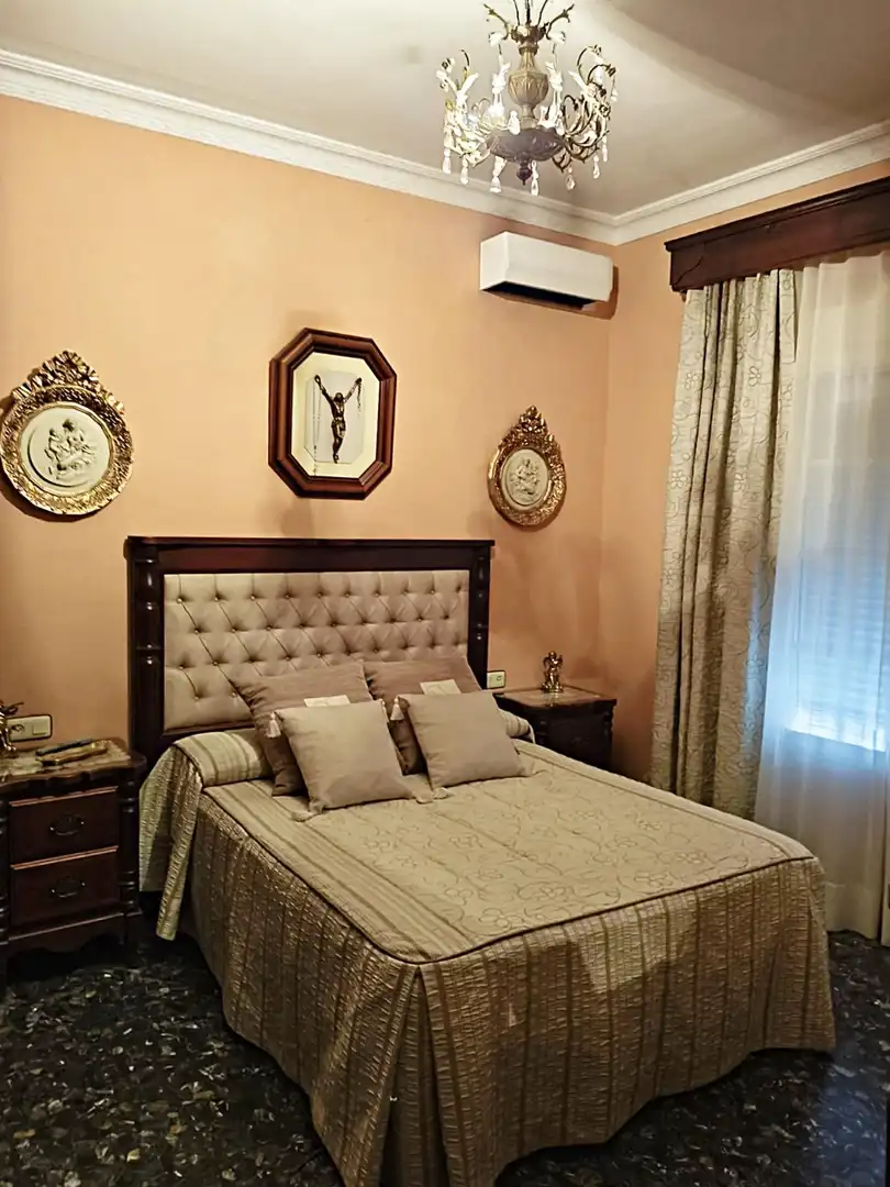 Habitación de Casa adosada en venta en Pilas con Aire acondicionado y Terraza