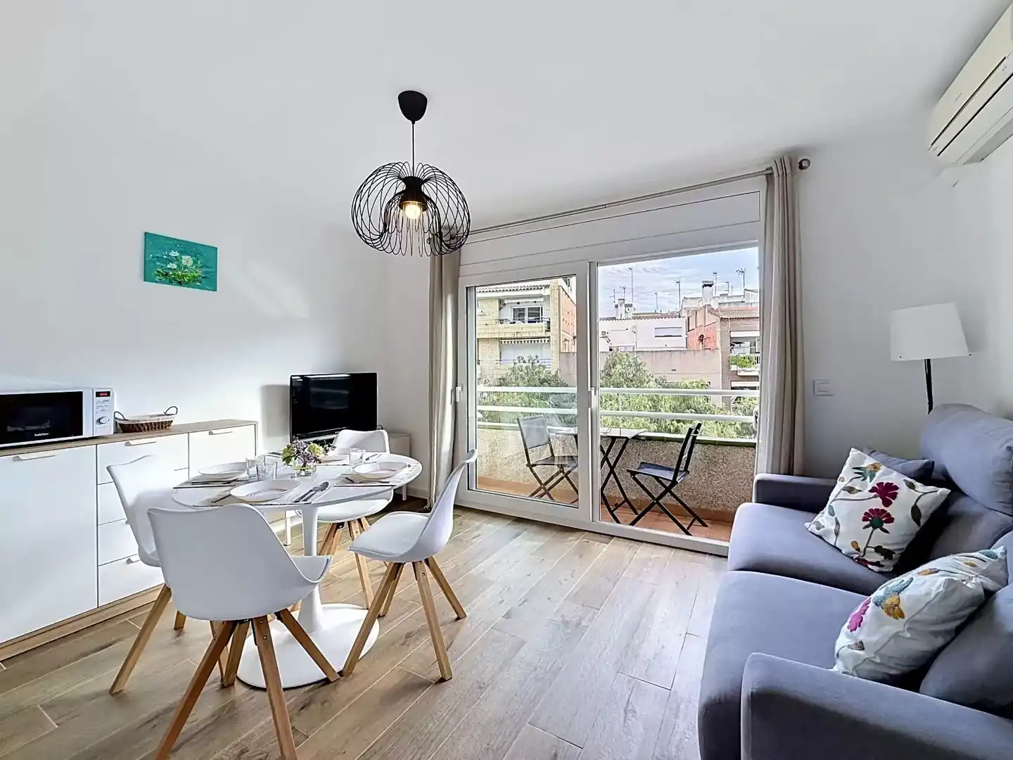 Sala de estar de Piso en venta en Roses con Aire acondicionado, Calefacción y Amueblado