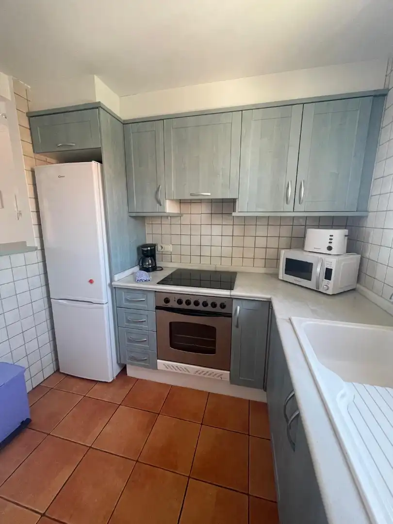 Kitchen of Attic for rent in Oliva  with Air Conditioner, Terrace and Furnished