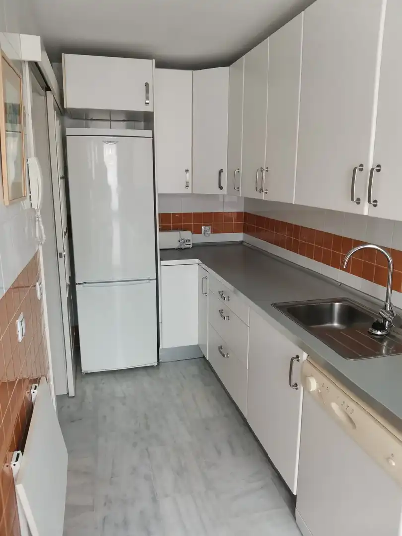 Cuina de Casa adosada de lloguer en El Portil amb Aire condicionat, Terrassa i Moblat