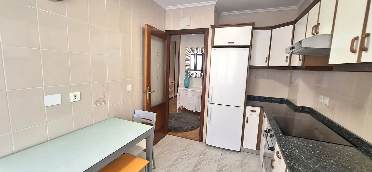 Kitchen of Flat for rent in Gijón   with Heating, Terrace and Swimming Pool