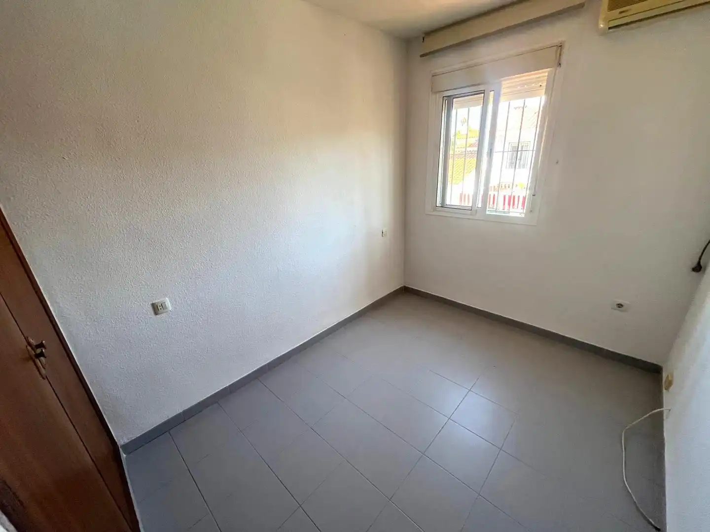 Dormitori de Casa adosada en venda en El Portil amb Moblat i Balcó