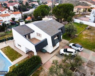 Vista exterior de Casa o xalet en venda en Torrelaguna amb Calefacció, Terrassa i Traster