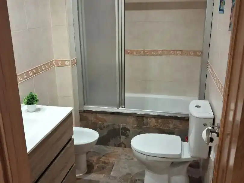 Bany de Casa adosada en venda en Sagunto / Sagunt amb Aire condicionat i Piscina