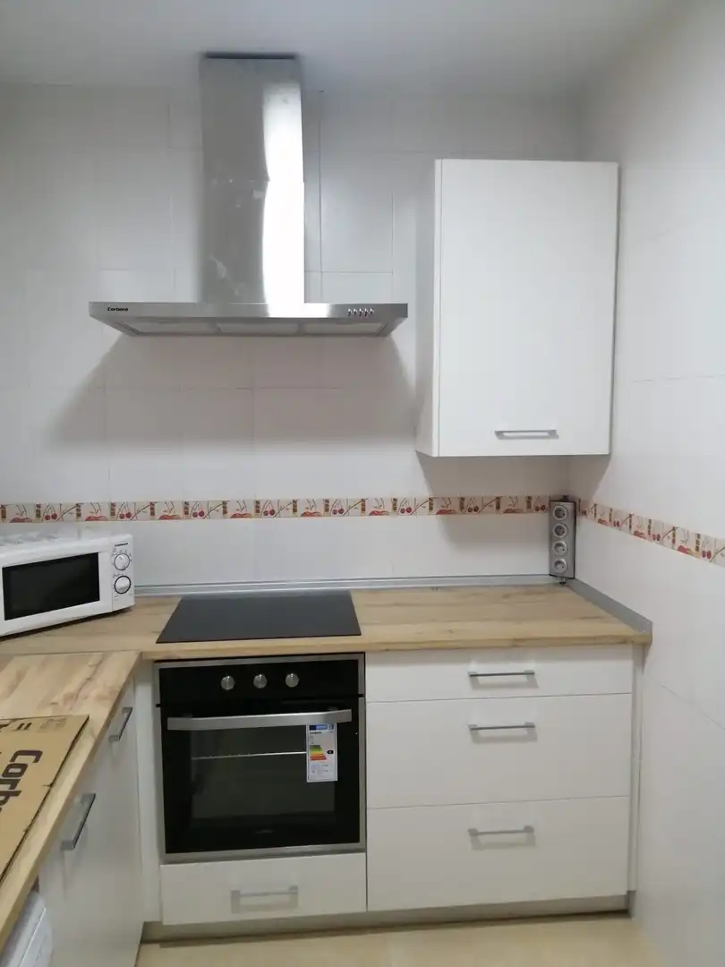 Kitchen of Apartments for rent in Villanueva de la Serena  with Heating, Furnished and Oven