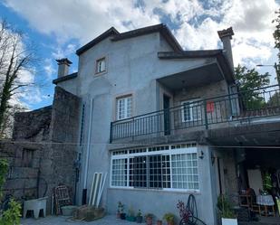 Vista exterior de Casa o xalet en venda en A Cañiza   amb Calefacció, Jardí privat i Terrassa