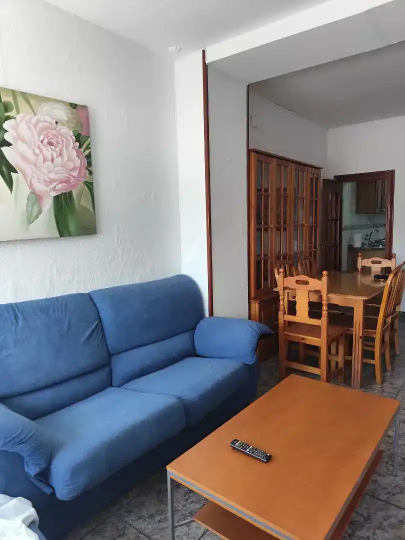 Sala d'estar de Casa adosada de lloguer en Almería amb Aire condicionat, Rentadora i Microones