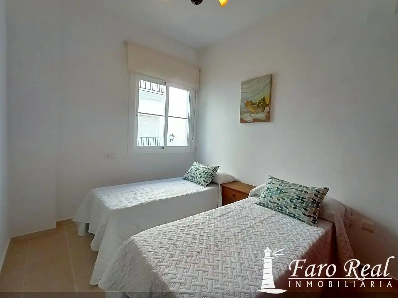 Dormitori de Apartament de lloguer en Sanlúcar de Barrameda amb Aire condicionat i Moblat