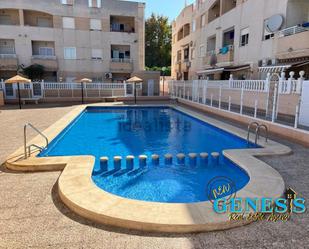 Swimming pool of Flat for sale in Torrevieja  with Air Conditioner and Balcony