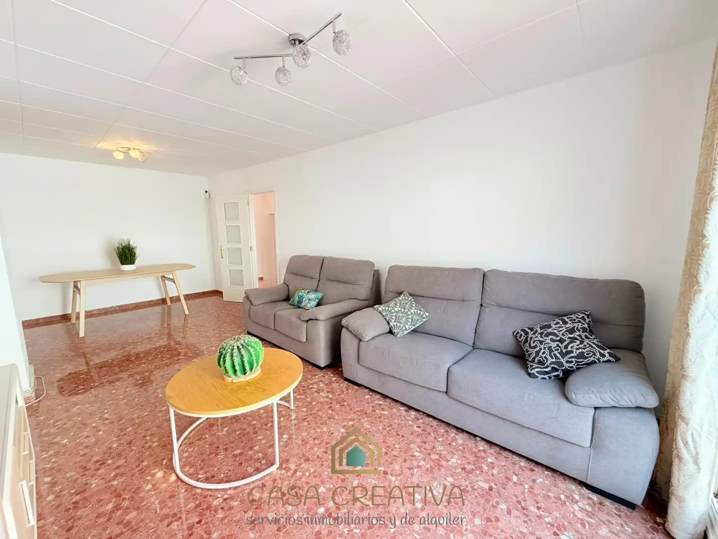Sala de estar de Casa adosada en venta en Picanya con Jardín privado, Terraza y Trastero