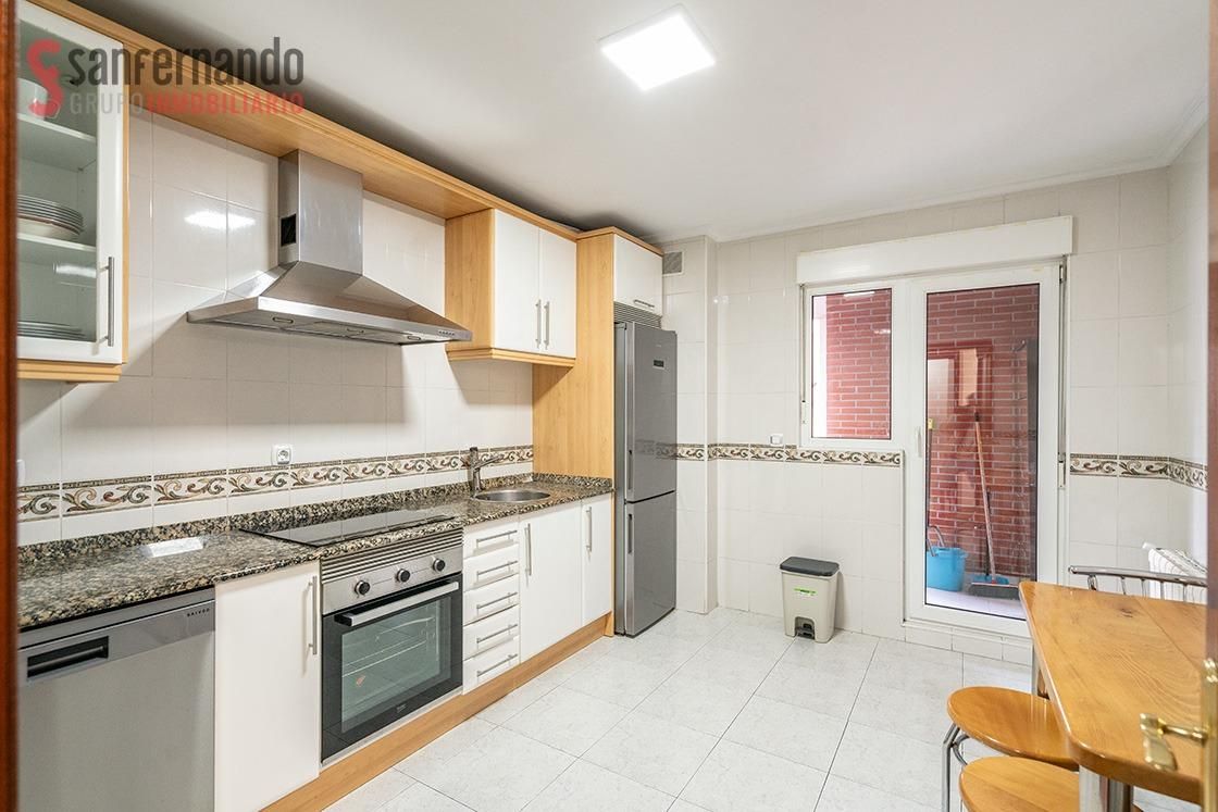 Kitchen of Duplex for sale in Torrelavega   with Heating and Balcony