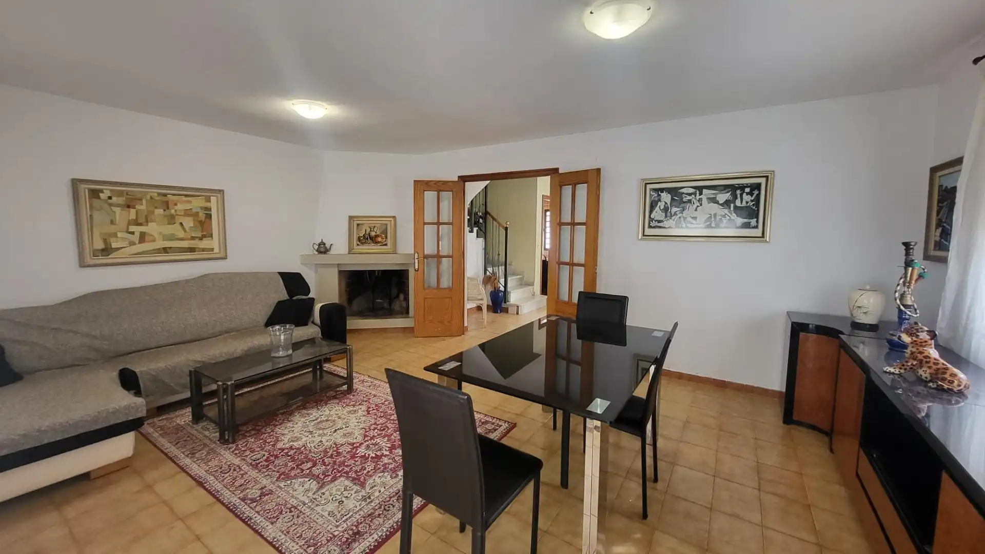 Sala d'estar de Casa adosada de lloguer en Gandia amb Aire condicionat, Calefacció i Jardí privat