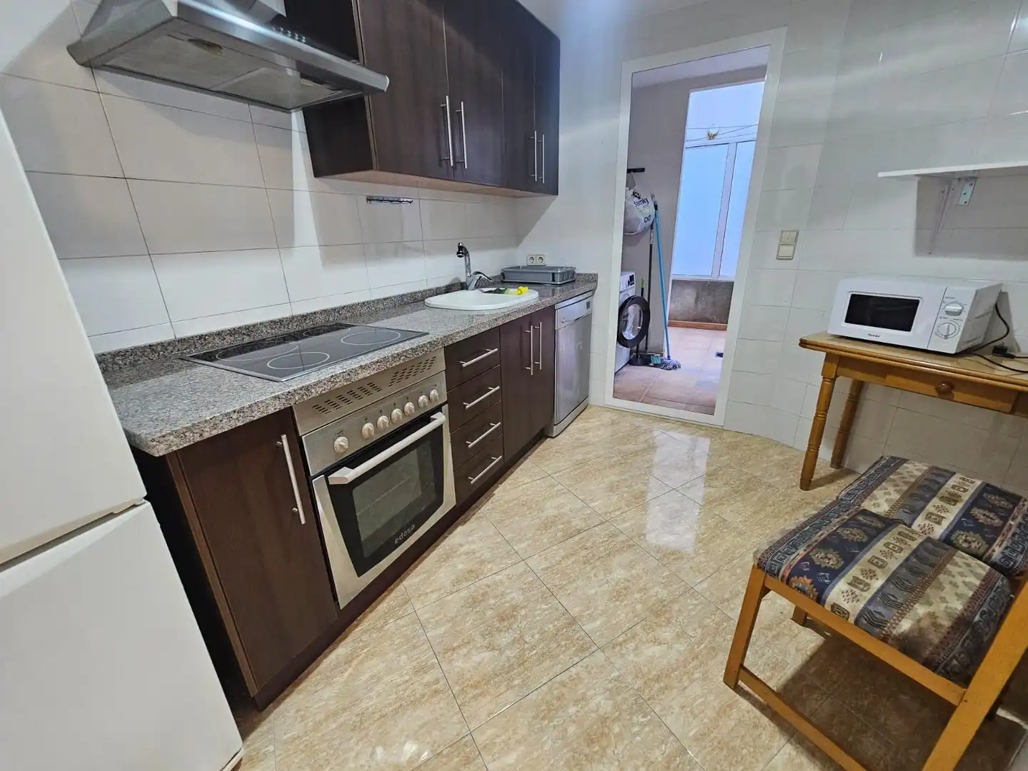 Kitchen of Flat for sale in Simat de la Valldigna  with Air Conditioner, Private garden and Balcony