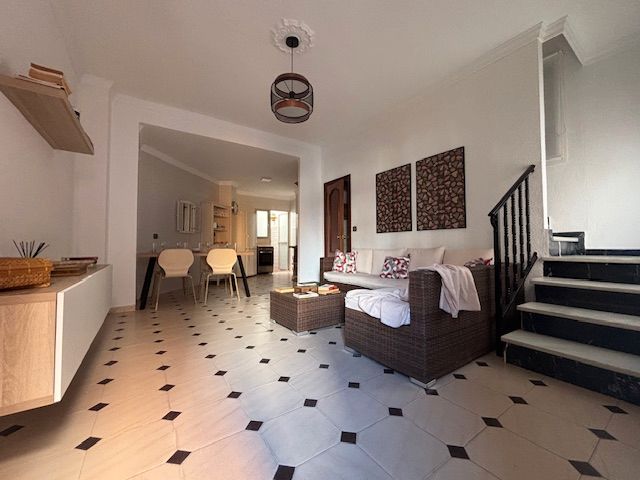Sala de estar de Casa adosada en venta en Málaga Capital con Aire acondicionado, Terraza y Amueblado