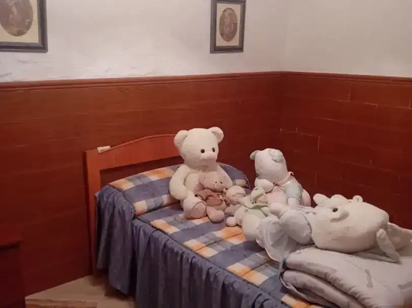 Dormitori de Casa adosada en venda en Martos amb Jardí privat, Traster i Piscina