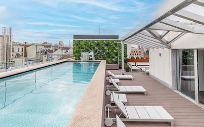 Swimming pool of Apartment for sale in  Madrid Capital  with Air Conditioner and Terrace