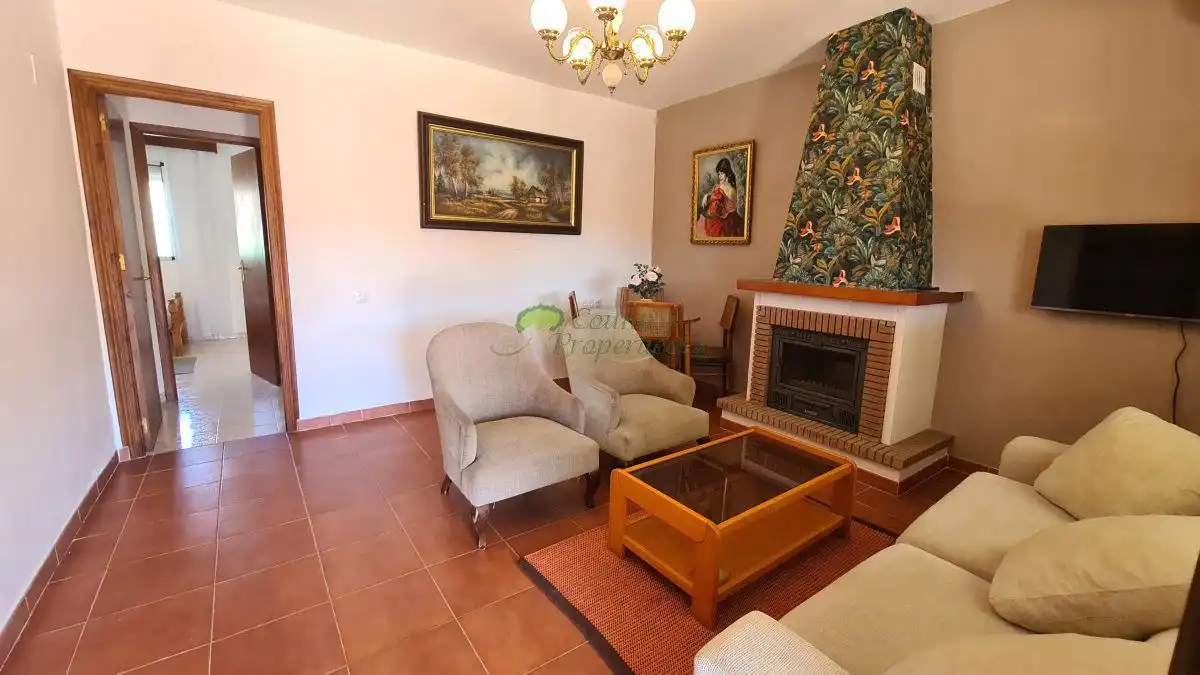 Sala de estar de Finca rústica en venta en Vélez-Málaga con Aire acondicionado, Jardín privado y Terraza