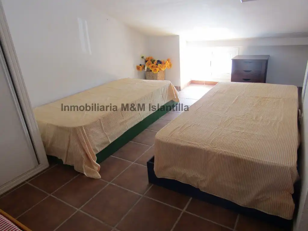 Habitación de Casa adosada en venta en Islantilla con Terraza, Trastero y Amueblado