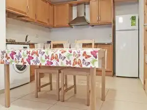 Cuina de Apartament de lloguer en Torredembarra amb Aire condicionat, Calefacció i Moblat