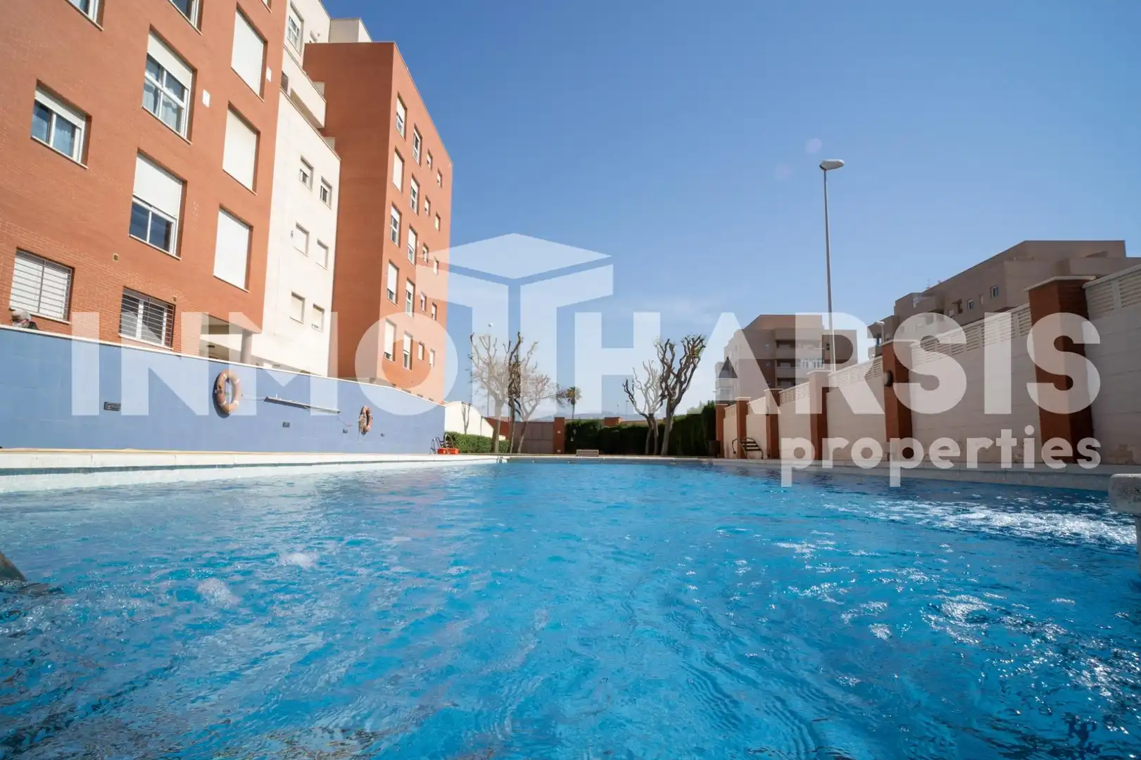 Swimming pool of Flat for sale in Almería  with Air Conditioner, Heating and Private garden