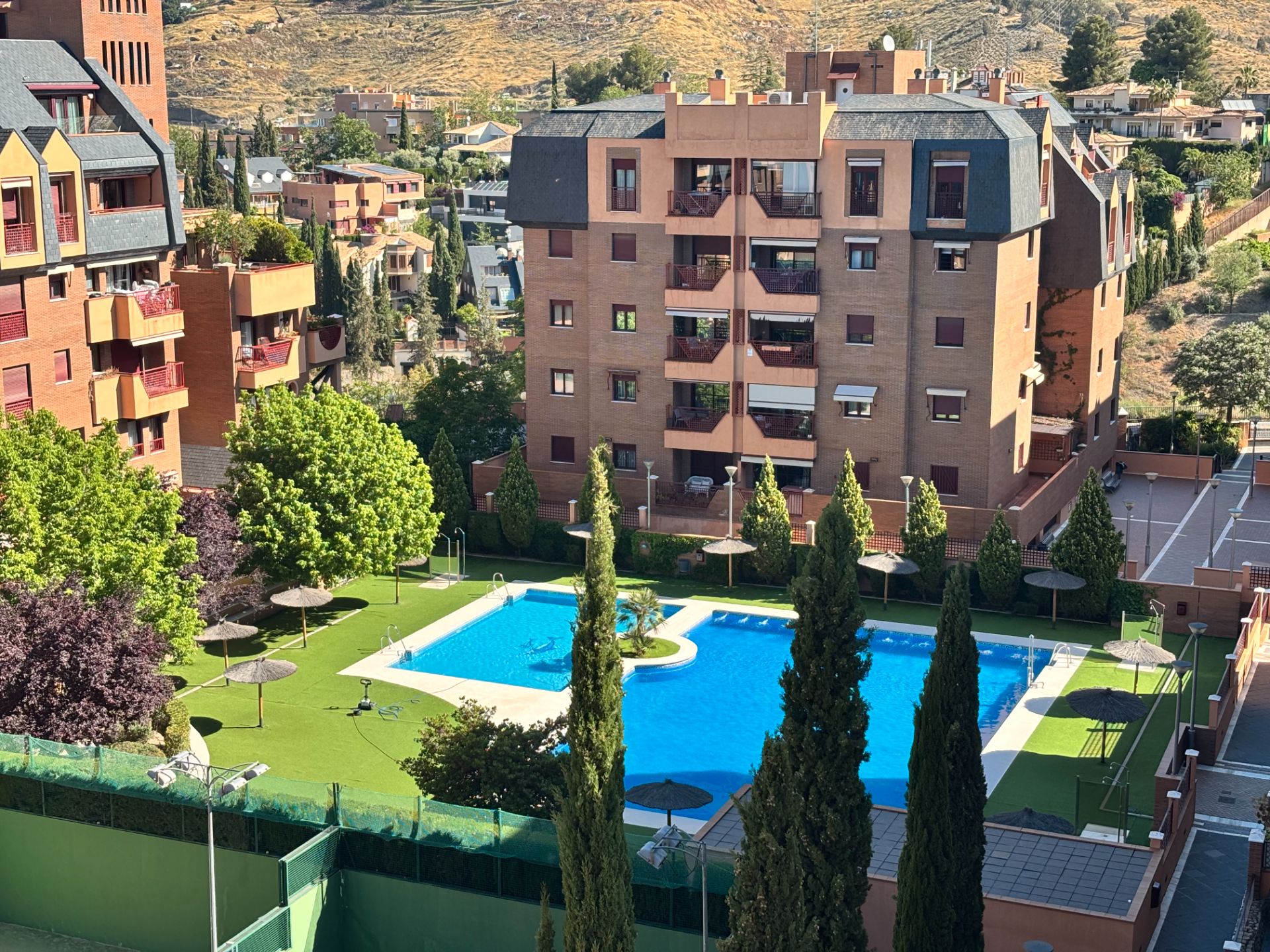Swimming pool of Attic for sale in  Granada Capital  with Air Conditioner, Heating and Private garden