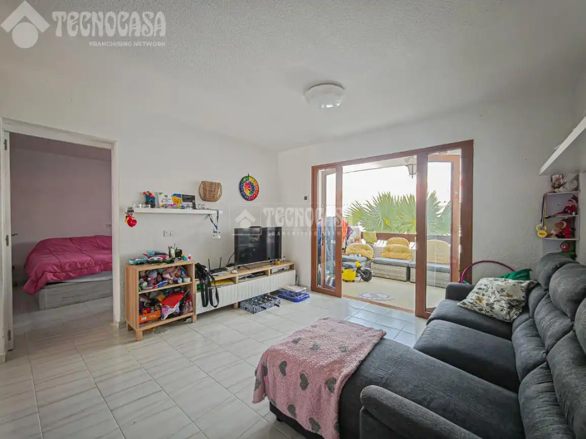 Sala de estar de Piso en venta en Arona con Piscina comunitaria