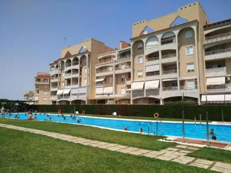 Piscina de Apartamento en venta en El Portil con Terraza, Trastero y Amueblado