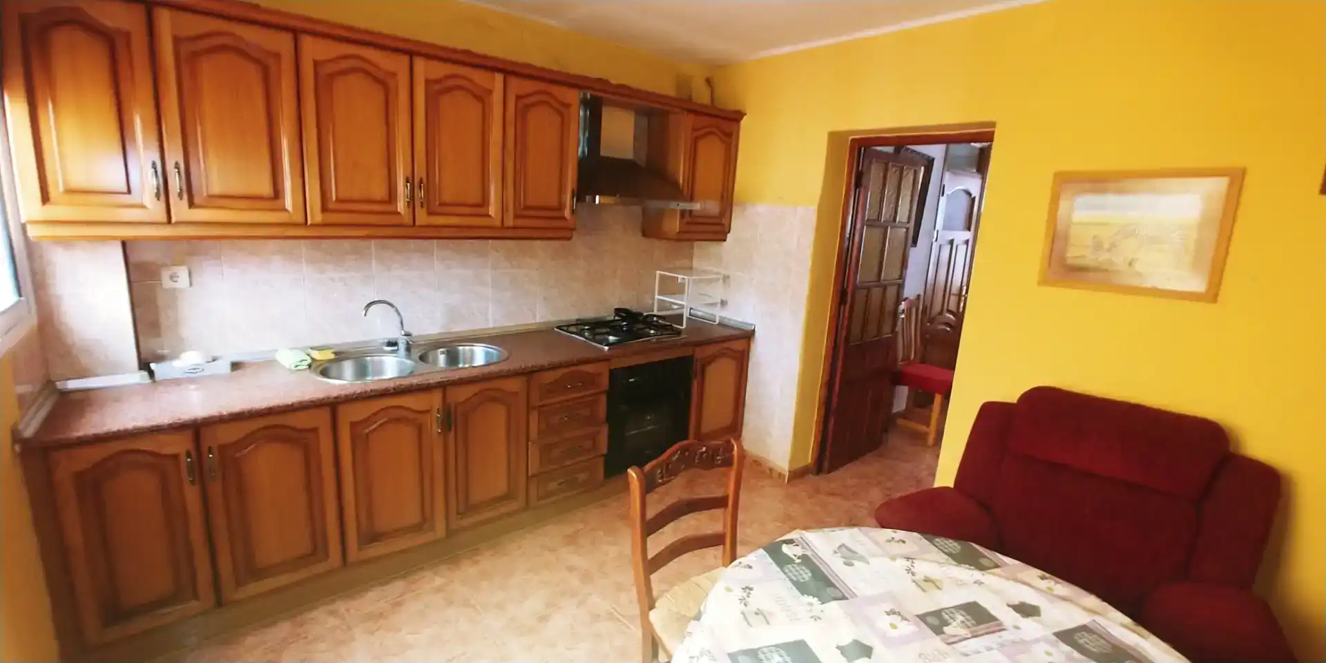 Cuina de Casa adosada de lloguer en Cuevas del Becerro amb Aire condicionat, Moblat i Rentadora