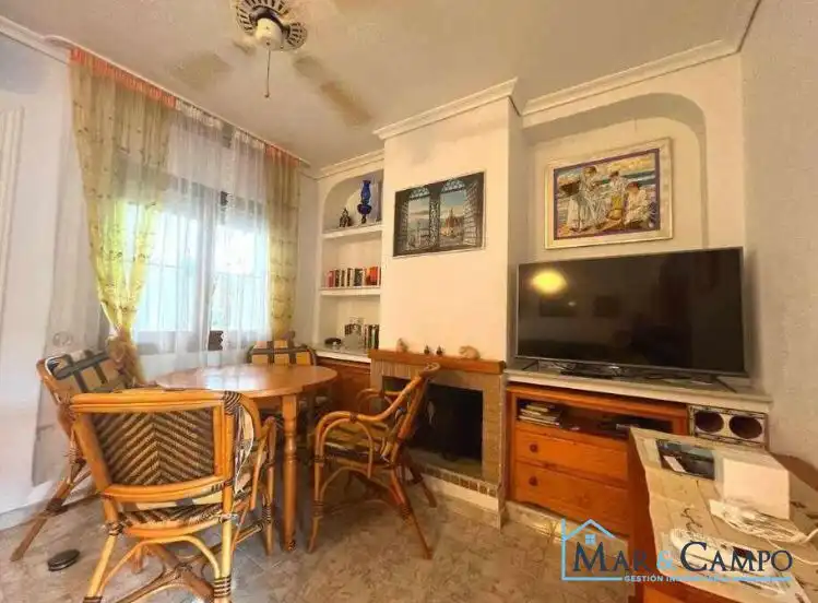 Sala de estar de Casa adosada en venta en Los Alcázares con Aire acondicionado, Jardín privado y Amueblado