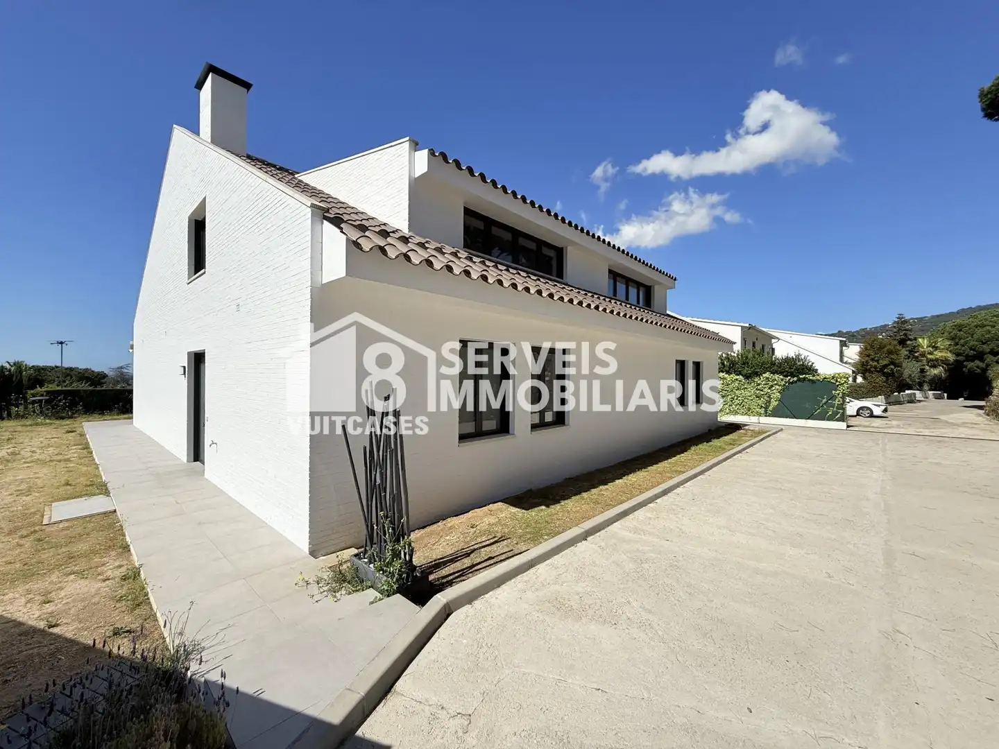 Vista exterior de Casa adosada en venda en Caldes d'Estrac amb Calefacció, Jardí privat i Terrassa