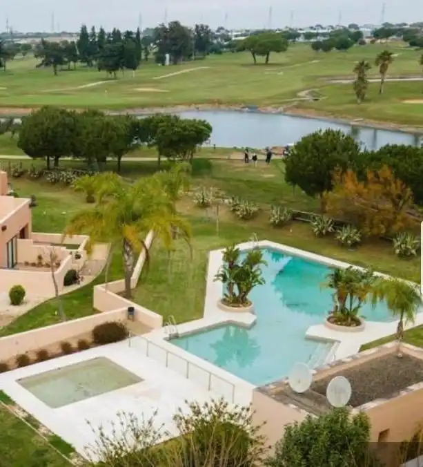 Piscina de Casa adosada de lloguer en Puerto Real amb Aire condicionat, Calefacció i Terrassa