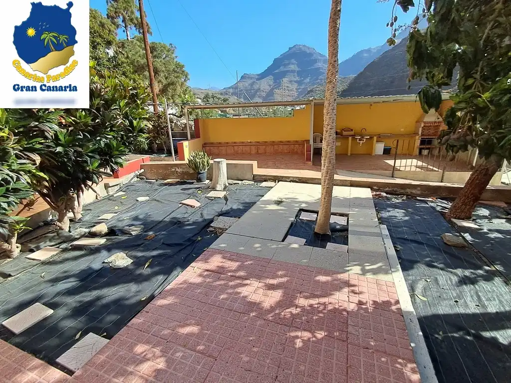 Außenansicht von Wohnung zum Verkauf in Mogán mit Privatgarten und Terrasse
