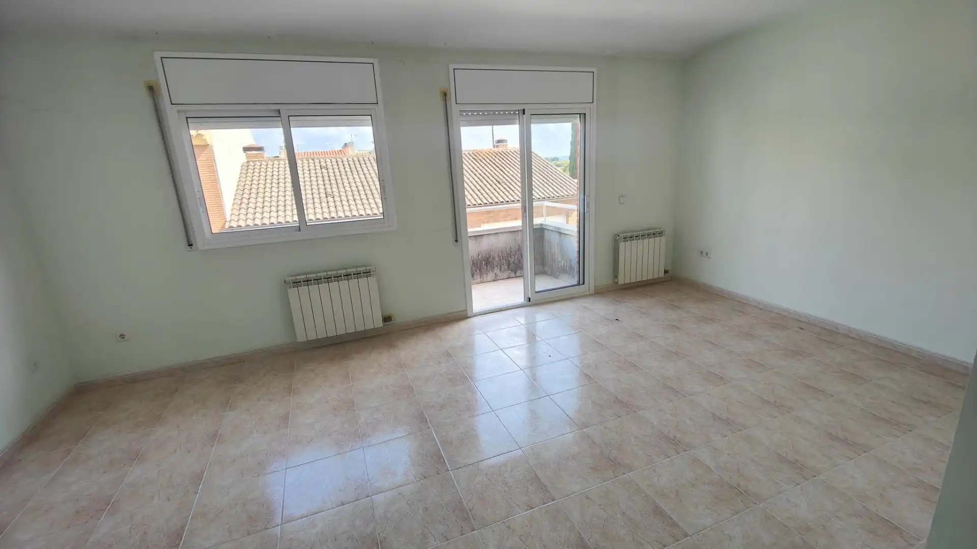 Sala d'estar de Casa adosada en venda en Vilanova i la Geltrú
