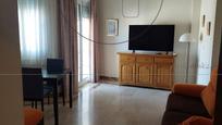 Sala d'estar de Pis de lloguer en Aljaraque amb Aire condicionat, Terrassa i Piscina comunitària