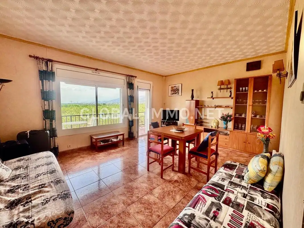 Sala de estar de Apartamento en venta en Roses con Calefacción, Terraza y Piscina