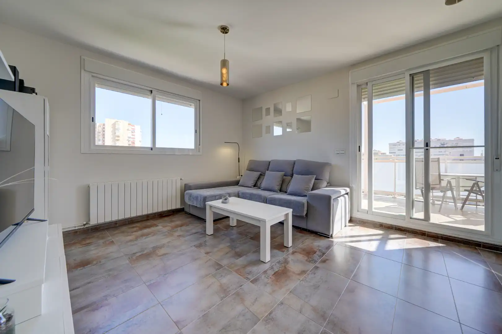 Wohnzimmer von Dachboden zum Verkauf in La Pobla de Farnals mit Klimaanlage, Heizung und Terrasse