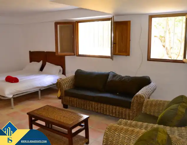 Sala de estar de Casa o chalet en venta en Santa Eulària des Riu con Terraza, Piscina y Amueblado