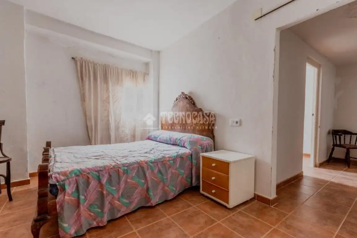 Dormitori de Casa adosada en venda en Güéjar Sierra amb Balcó