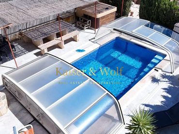 Casa rústica amb piscina en venda a Marxant