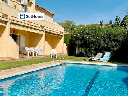 Swimming pool of Single-family semi-detached for sale in L'Escala  with Air Conditioner