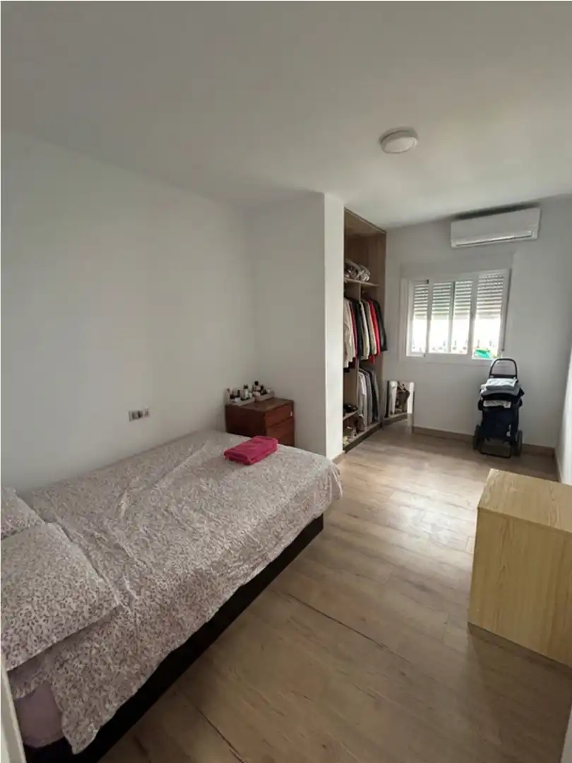 Habitación de Casa adosada en venta en Málaga con Aire acondicionado