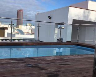 Swimming pool of Attic for sale in  Sevilla Capital  with Air Conditioner, Heating and Terrace