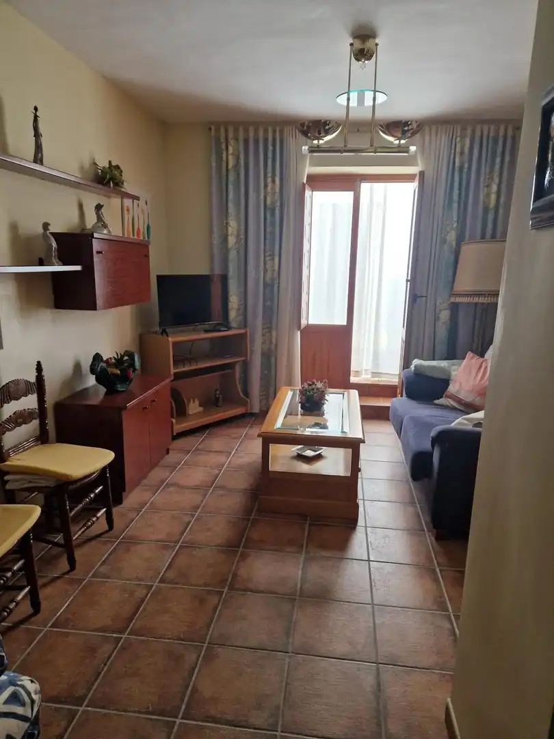 Sala d'estar de Casa adosada en venda en Jayena amb Traster, Moblat i Balcó