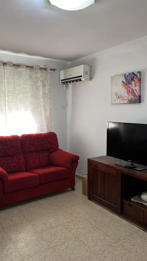 Sala d'estar de Pis de lloguer en Sevilla amb Aire condicionat, Calefacció i Moblat