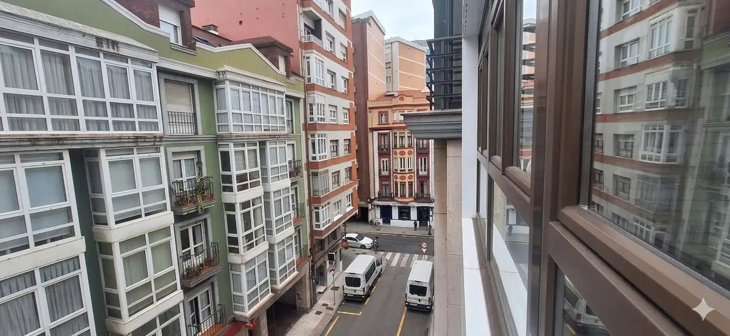 Vista exterior de Piso en venta en Gijón  con Calefacción y Piscina