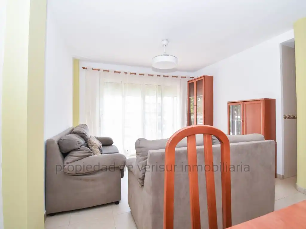 Dormitori de Apartament de lloguer en Águilas amb Terrassa, Piscina i Moblat