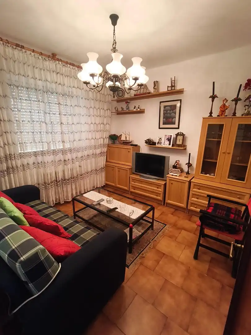 Sala de estar de Casa adosada en venta en Melgar de Fernamental con Calefacción, Jardín privado y Terraza